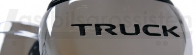 Ratknop med motivet "Truck" i sort plast/metal